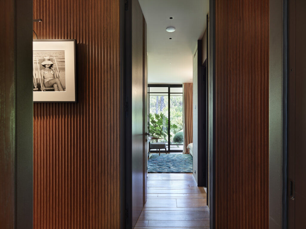 01_internal hall Luxury villa interior design South of France — refined wood and stone interiors